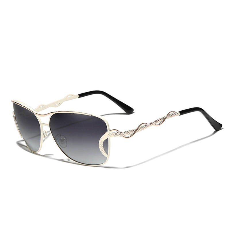 Óculos de Sol Feminino com armação em liga metálica e polímeros plásticos de alta densidade, com lentes polarizadas degradê de policarbonato com proteção UV400.;Loja Livre Arbítrio